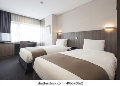 A Hotel Room, Bedroom With Two Beds, Curtain, Lighting Front View At The Day In Seoul, South Korea.