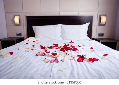 hotel room with big bed and white bedding