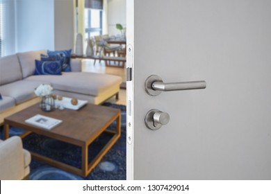 Hotel Room , Condominium Or Apartment Doorway With Open Door In Front Of Blur Bedroom Background