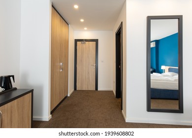 Hotel Room Entrance Corridor With Wooden Closet