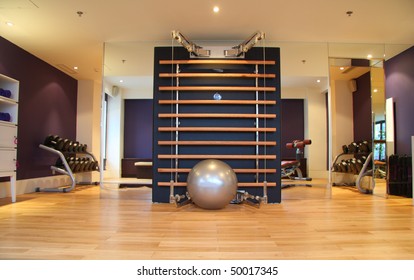 Hotel Room With Gym Equipment