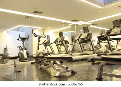 Hotel Room With Gym Equipment