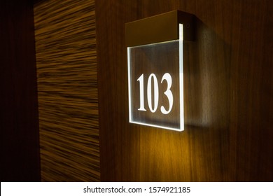 Hotel Room Number On Wooden Wall