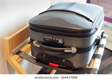 Hotel Room With A Suitcase On The Luggage Place