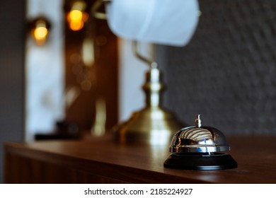Hotel service bell on a table in hotel. Concept of hotel or restaurant - Shutterstock ID 2185224927
