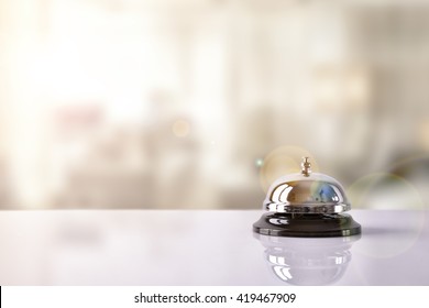 Hotel service bell on a table white glass and simulation hotel background. Concept hotel, travel, room - Shutterstock ID 419467909