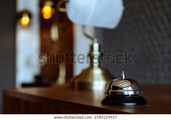 Hotel service bell on a table in hotel.\
Concept of hotel or\
restaurant