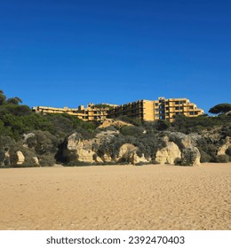 A hotel at the side of the beach