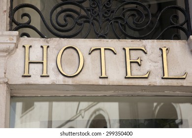 Hotel Sign Above Building Entrance