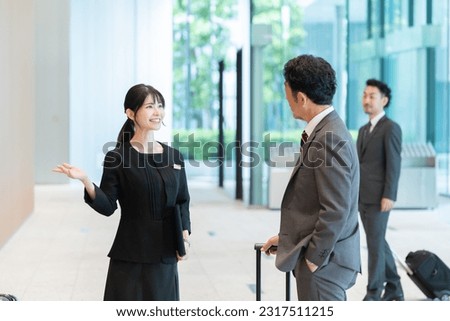 Image, Stock Photo departed I The hotel key with pendant and the number 7 lies on an unmade white covered bed