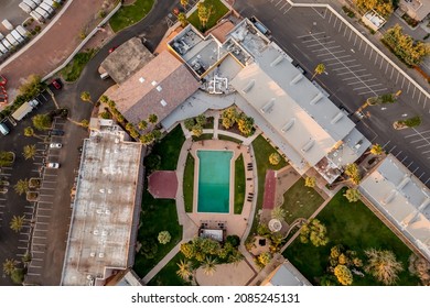 Hotel With Swimming Pool. Drone Overhead Shot.	
