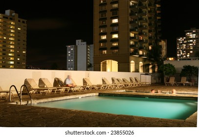 Hotel With Swimming Pool Late At Night.