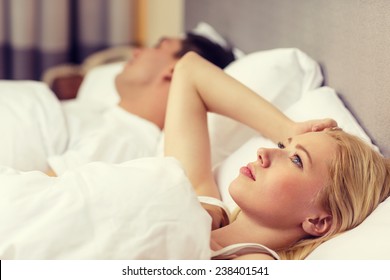 Hotel, Travel, Relationships, And Problems With Sleep Concept - Family Couple In Bed, Woman With Insomnia