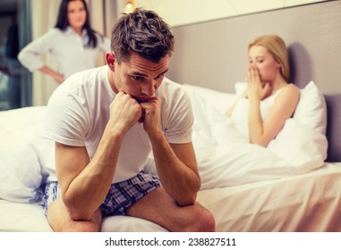 Hotel, Travel, Relationships And Sexual Problems Concept - Wife Caught Man Cheating With Another Woman