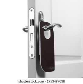 Hotel Wooden Door With Blank Hanger On White Background, Closeup