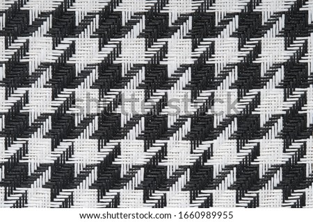 Houndstooth fabric pattern. Black and white pattern.