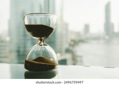 Hourglass with cityscape on panoramic skyline and buildings in the morning background with sun light. The concept of modern life, business, time, management and city life. - Powered by Shutterstock