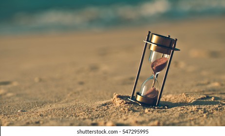 Hourglass on a sand dune beach. (vintage style)