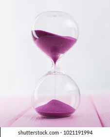 Bright Colored Pink Sand Hourglass On Stock Photo (Edit Now) 1320924989