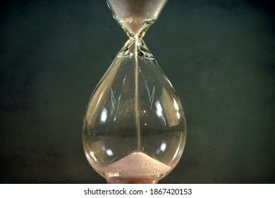 Hourglass. Sands Move Through Hour Glass. Close Up.