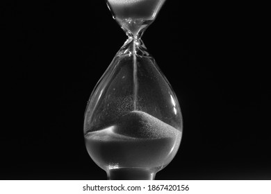 Hourglass. Sands Move Through Hour Glass. Close Up. Seize The Moment, Pass Of Time, Time That Flees