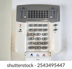 House alarm system. Keys and buttons on security pad. Alarm keypad. 