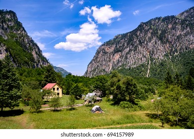 House in the background of the mountains
