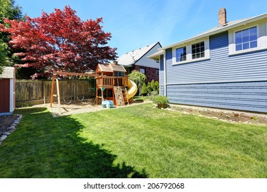 House Backyard With Lawn And Playground For Kids