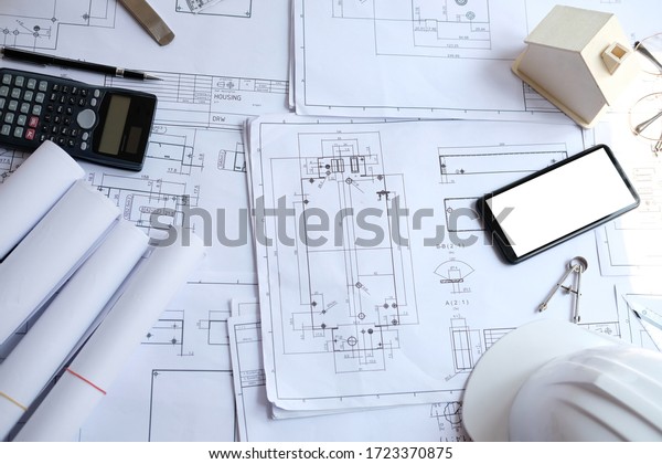 house blueprint of real\
estate project at architect engineer  workplace. building and\
construction concept