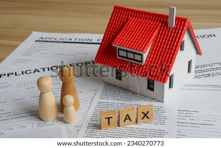 House or building or land value  property tax, local development tax concept : Word tax, home model 