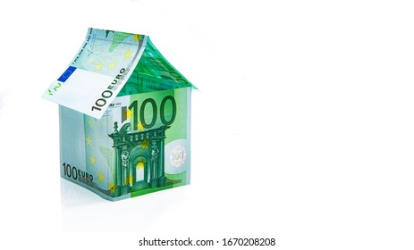 House Built Of Banknotes Isolated