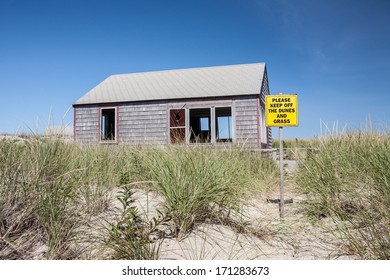 A house built on an eroding beach on Cape Cod, Massachusetts is soon to be demolished as strong storms and sea level rise due to climate change threatens the coastline.
