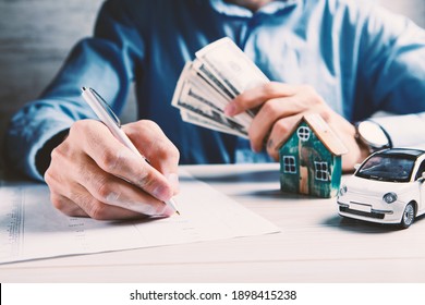 house and car purchase contract - Shutterstock ID 1898415238