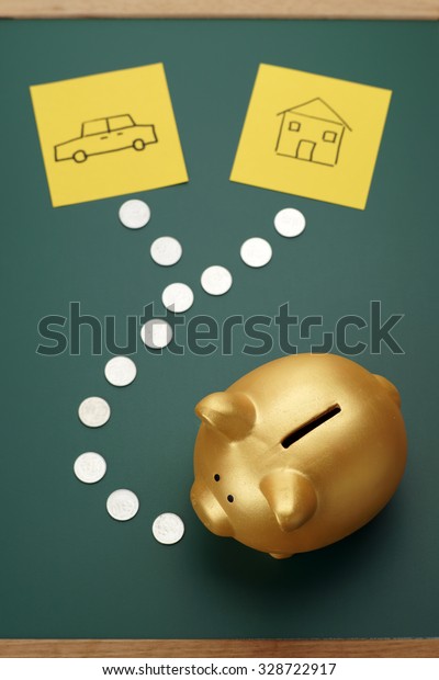 House and car savings - golden piggy bank, coins\
and house and car sketch