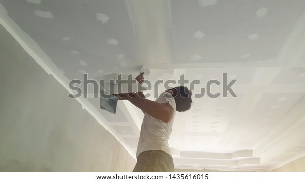 House Ceiling That Construction Workers Plastering Stock