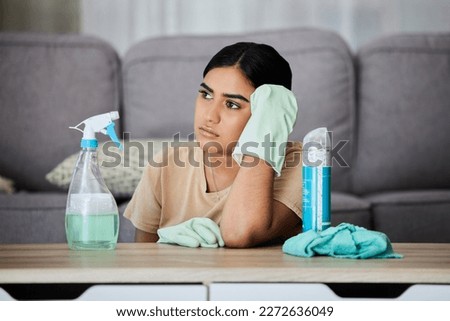 House, cleaning and bored woman thinking, tired and annoyed with household task, sad and frustrated. Lazy, cleaner and Indian girl contemplating, daydream and distracted from bacteria or dust cleanup