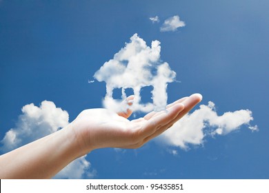 house cloud in hand - Powered by Shutterstock