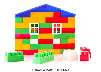 House Constructed From Toy Bricks Isolated On White