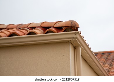 House Corner With Beige Sand Metal Siding And Roof With Steel Gutter Rain System