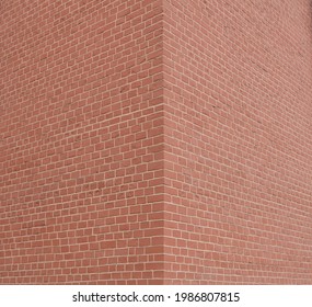 House Corner, Brick Wall Painted With Red Paint.