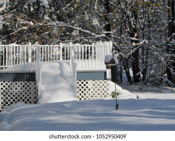 House And Deck In The Lower Hudson River Valley Of New York State, Covered With With Snow.