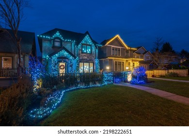 House Decorated And Lighted For Christmas At Night At Vancouver, Canada.