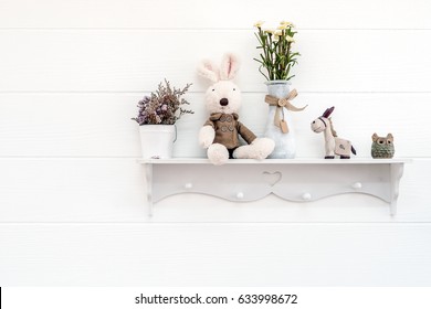 House Decoration, Wall Decoration, Decorated With Shelf Attached On A Wall, Probably In The Kid's Room