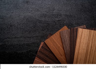 House Design Concept Wood And Color Sample Material On Black Stone Table