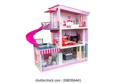 House Of Dolls With Furniture Isolated On White Background. Furnished Pink Doll House Isolated. Dollhouse. House Construction With Kitchen Bedroom Bathroom And Pool Interior