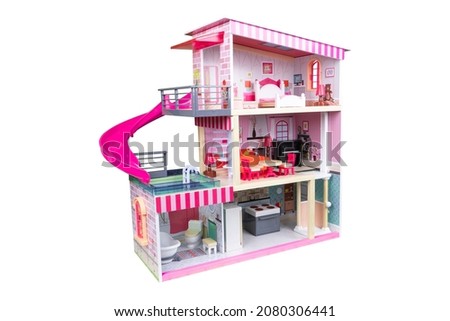 House of dolls with furniture isolated on white background. Furnished pink doll house isolated. Dollhouse. House construction with kitchen bedroom bathroom and pool interior