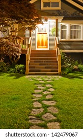 House Entrance With Nicely Paved Long Doorway  At Night, Dawn Time.