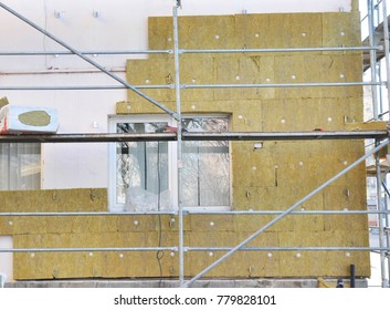 House External Wall Insulation With Fiberglass. Energy Saving Concept. Fiber Glass Insulation Delivers Proven Performance  At A Greater Value Compared To Other Types Of Insulation Materials.