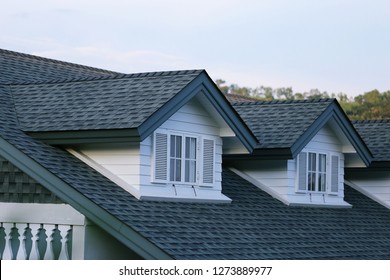 House garret closeup blur sky background - Shutterstock ID 1273889977