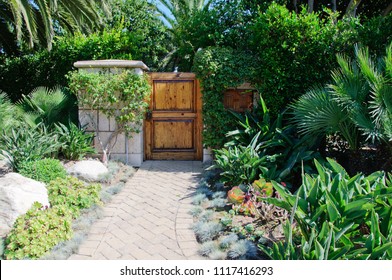 House with green lawn manicured frontyard garden in suburban residential neighborhood - Shutterstock ID 1117416293